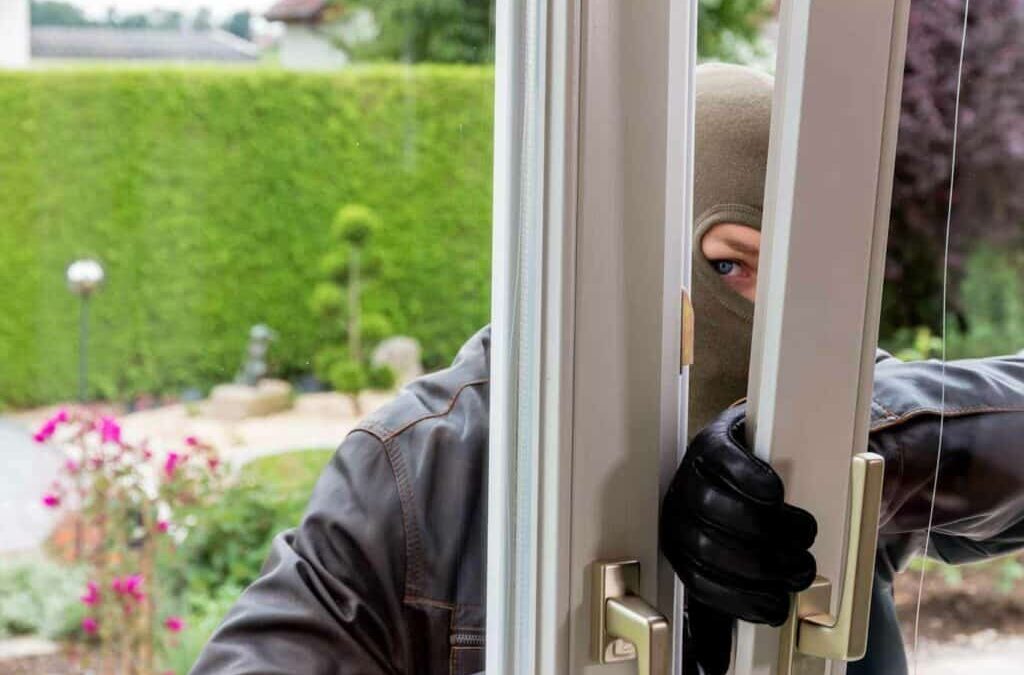 Burglar trying to pry open doors